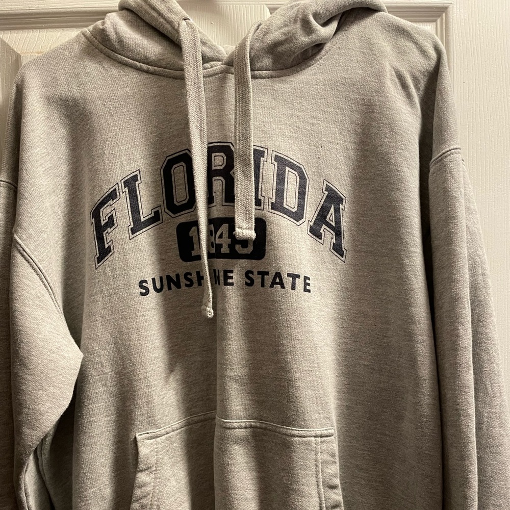 Jacket, the size is L, the brand is Ganix INC, the color is gray.